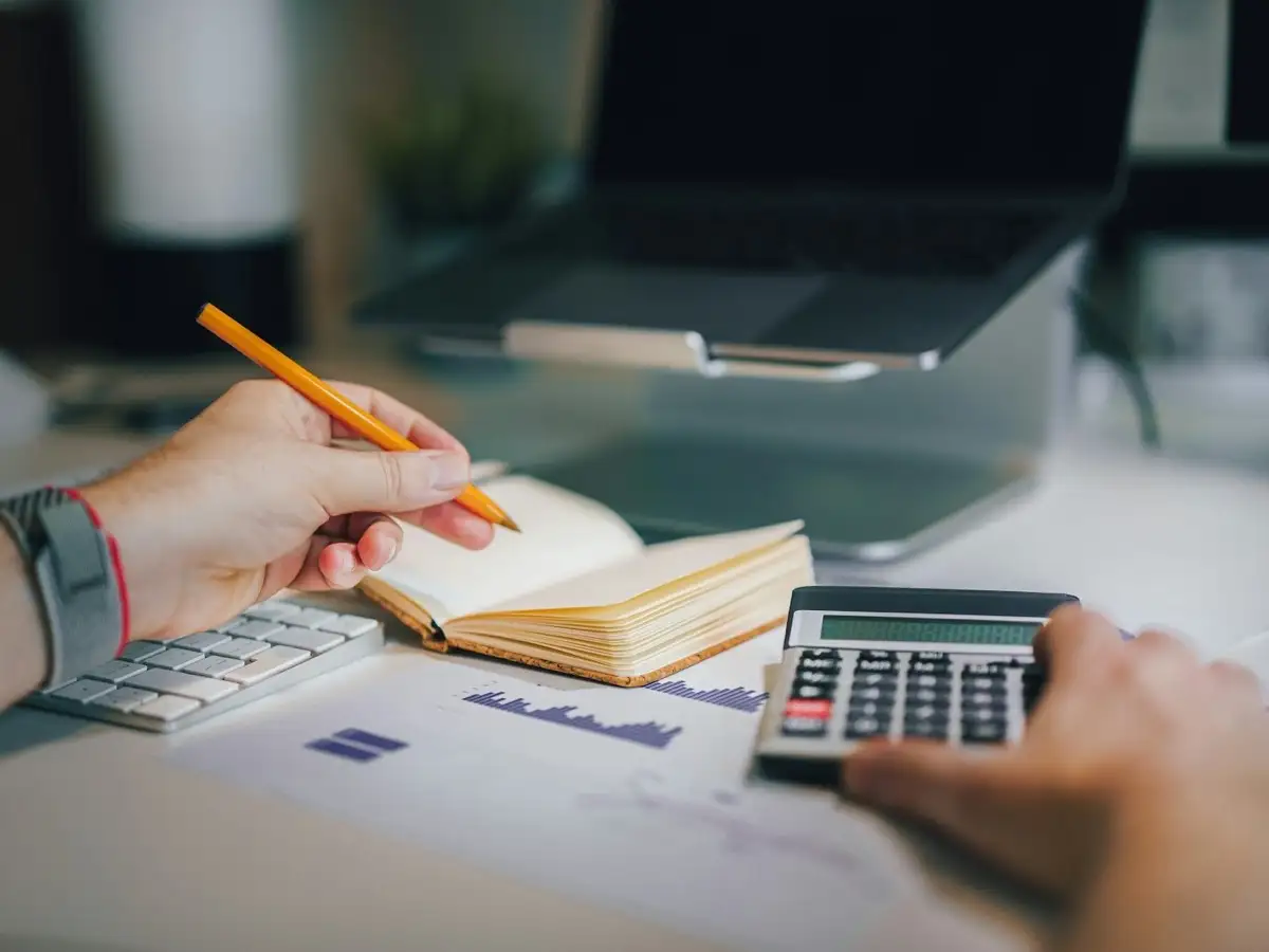 Notebook and calculator on a desk