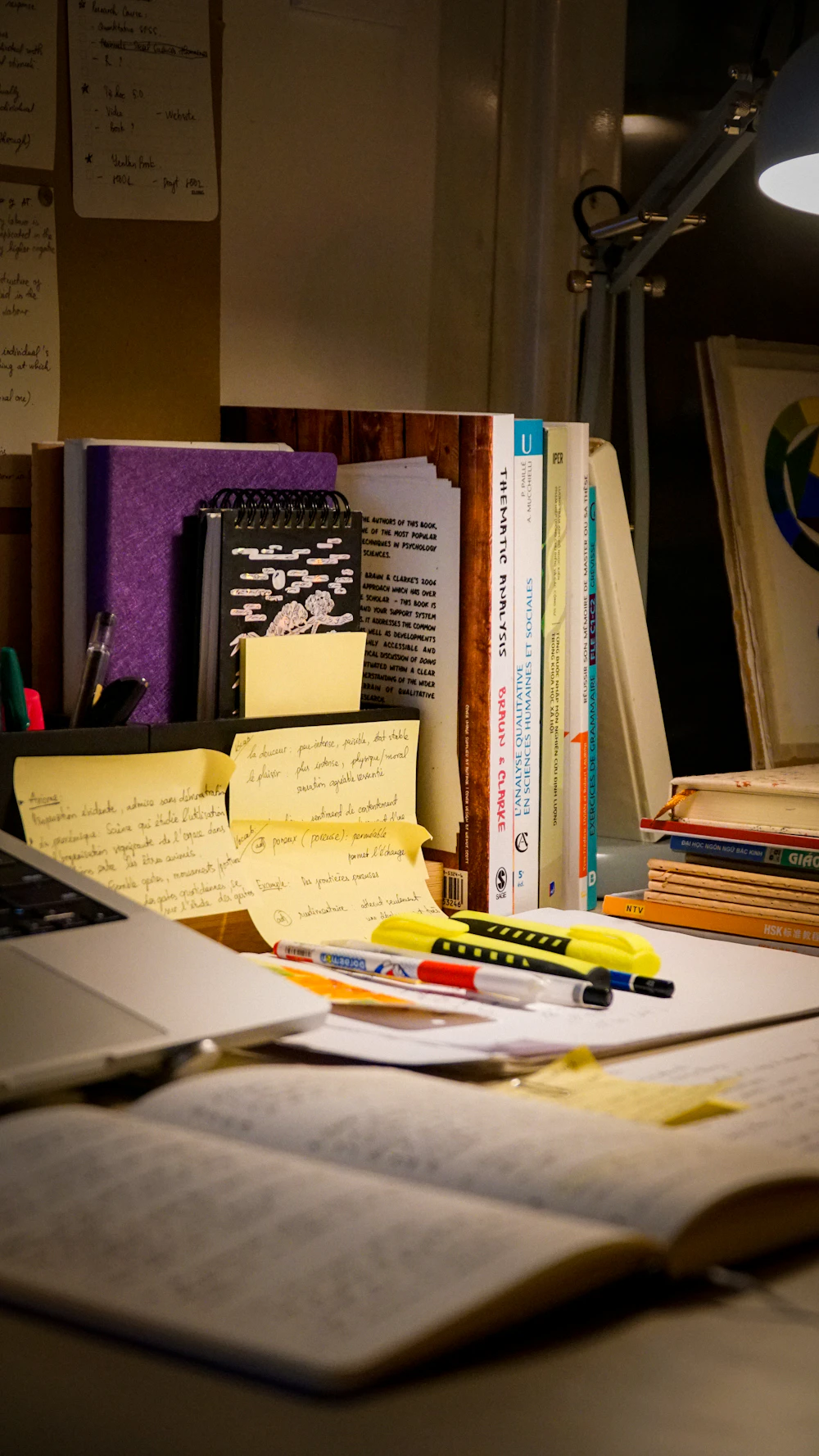 An open notebook on a desk used for journaling and tracking patterns