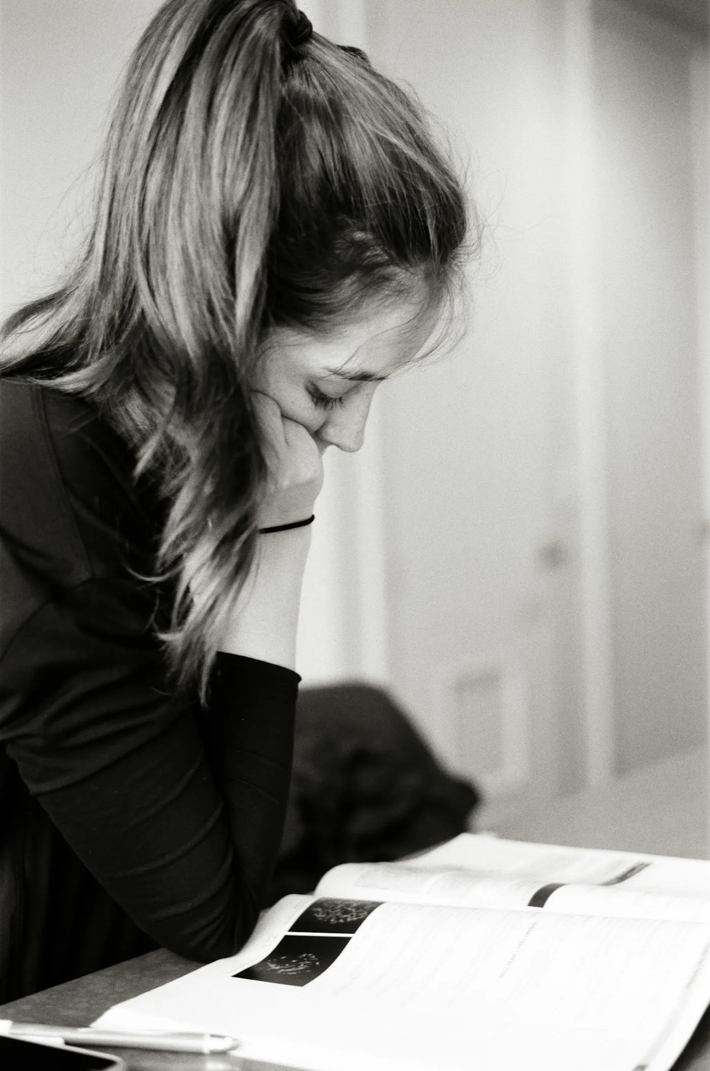 Professional reviewing documents and credentials, representing Ventoutt's therapist and coach vetting process